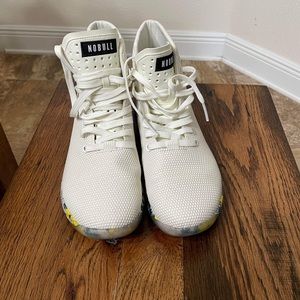 Women’s 8.5 high top NoBull Trainers.